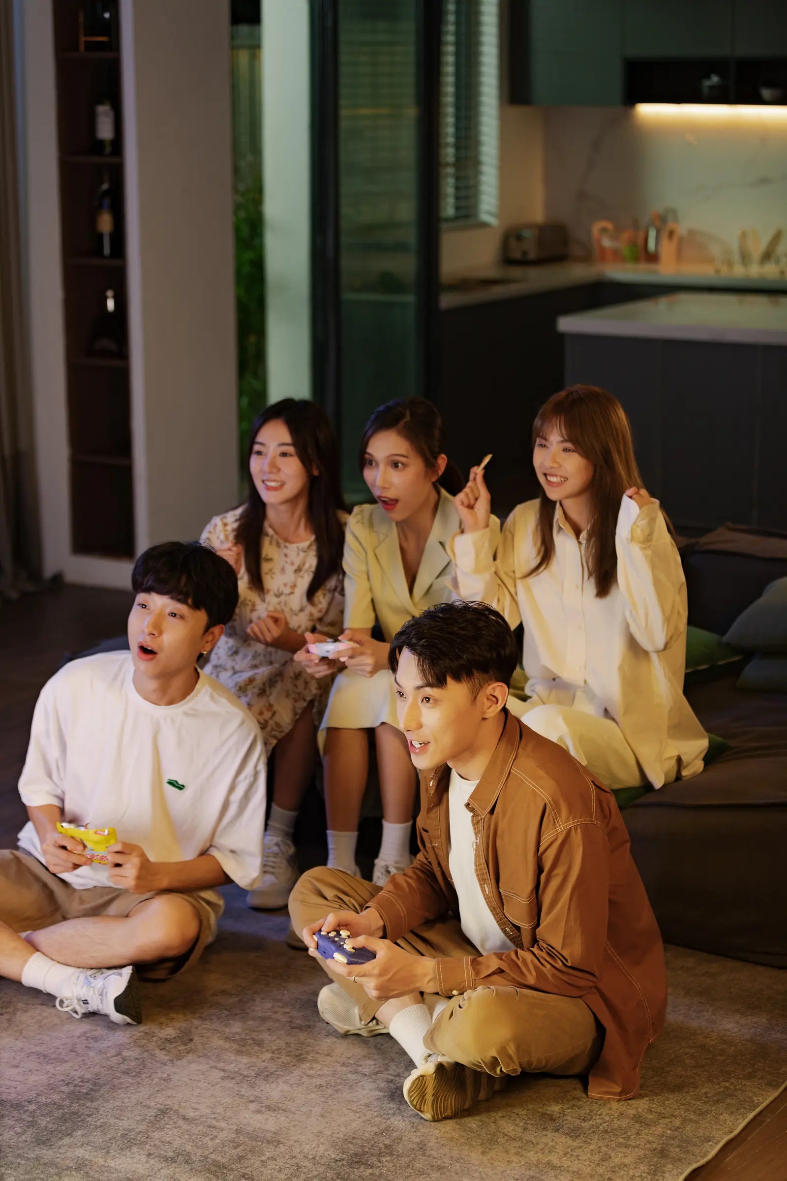 Friends sharing a multiplayer gaming moment